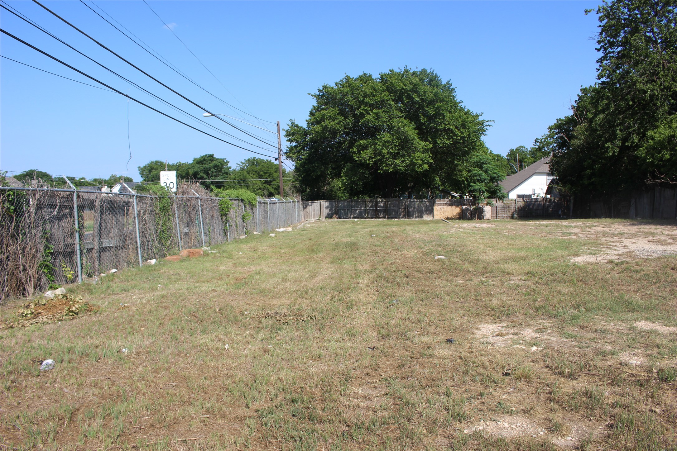 7109 Bennett Avenue Austin, TX 78752 - Photo 5 of 16 a backyard of a house with table and chairs