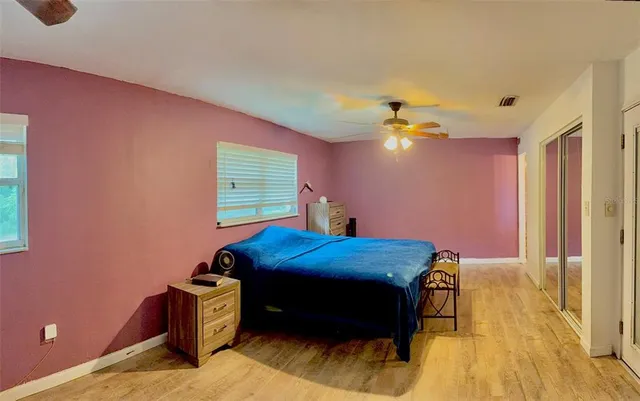 a view of a balcony with chair and table