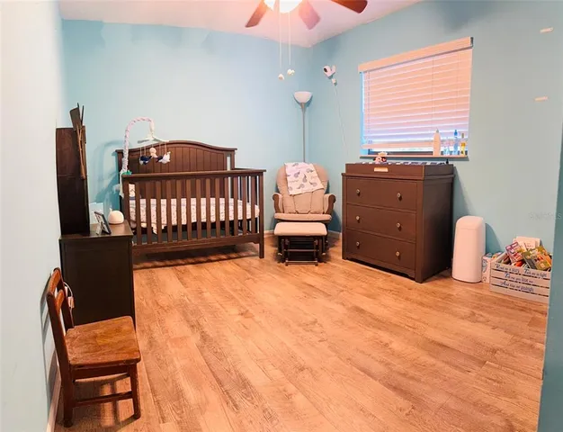 a view of a big room with carpet