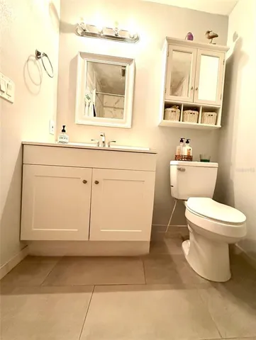 a view of a livingroom with an empty space and a sink