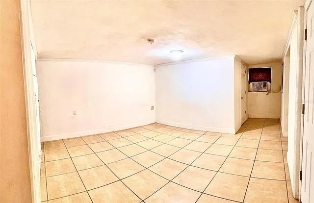 a bath room with a toilet and a bath tub