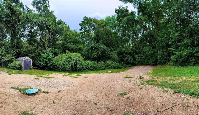 a view of a road with a yard