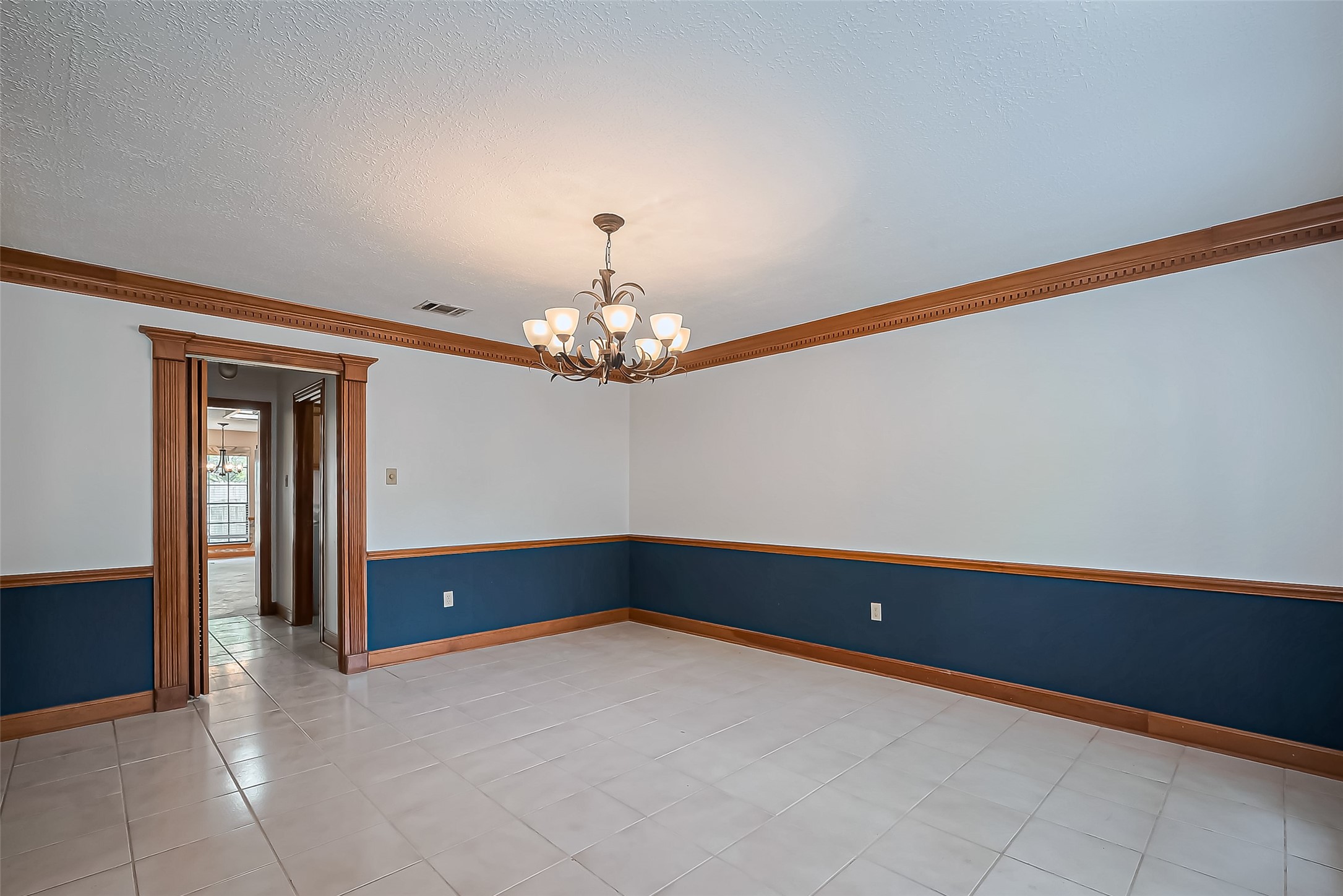 18307 Champion Forest Drive Spring, TX 77379 - Photo 17 of 49 wooden floor in an empty room with a window