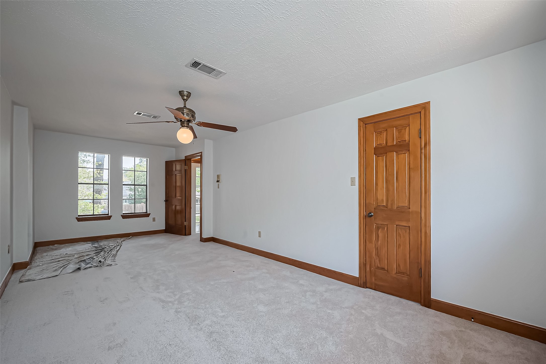 18307 Champion Forest Drive Spring, TX 77379 - Photo 35 of 49 a view of an empty room with a window