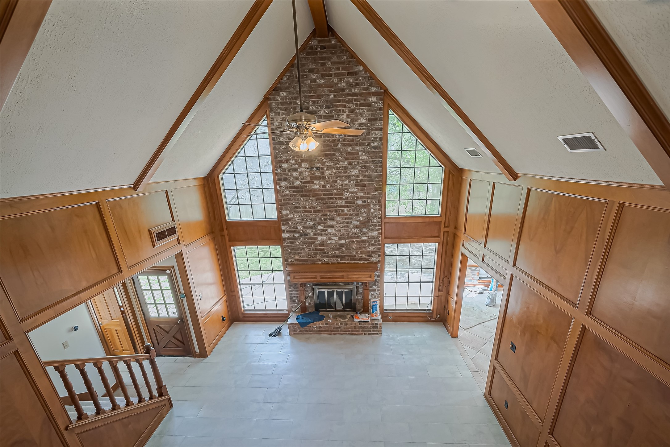 18307 Champion Forest Drive Spring, TX 77379 - Photo 43 of 49 a living room with furniture and a fireplace