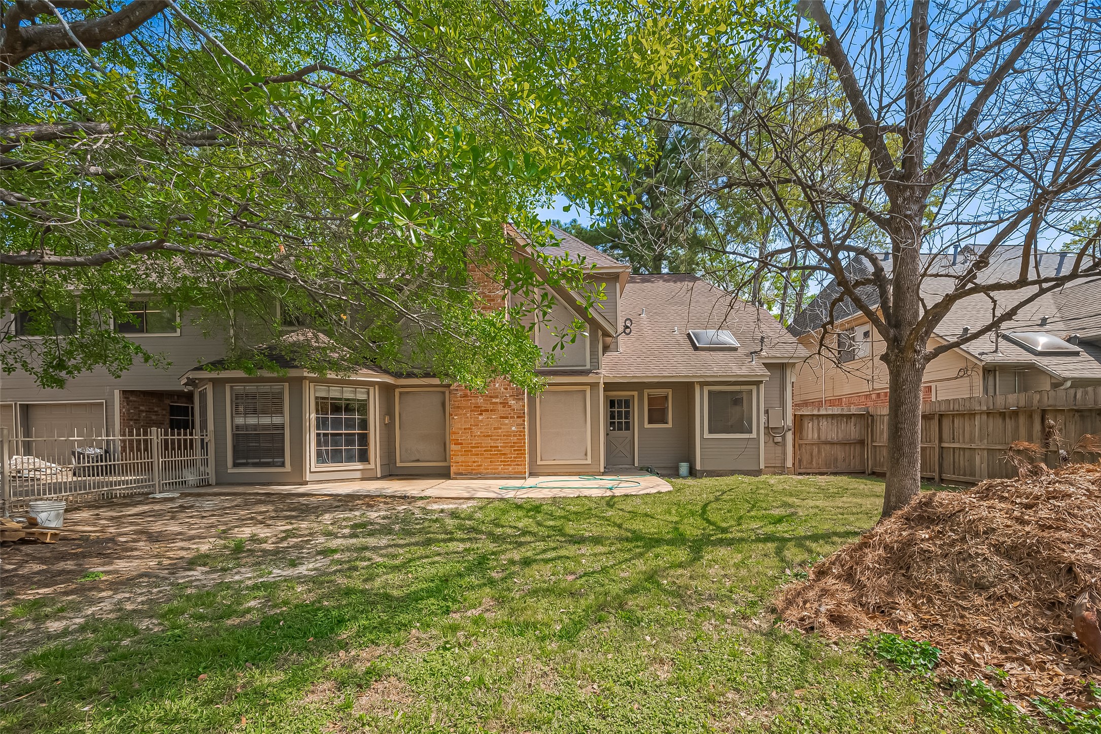 18307 Champion Forest Drive Spring, TX 77379 - Photo 45 of 49 front view of a house with a yard