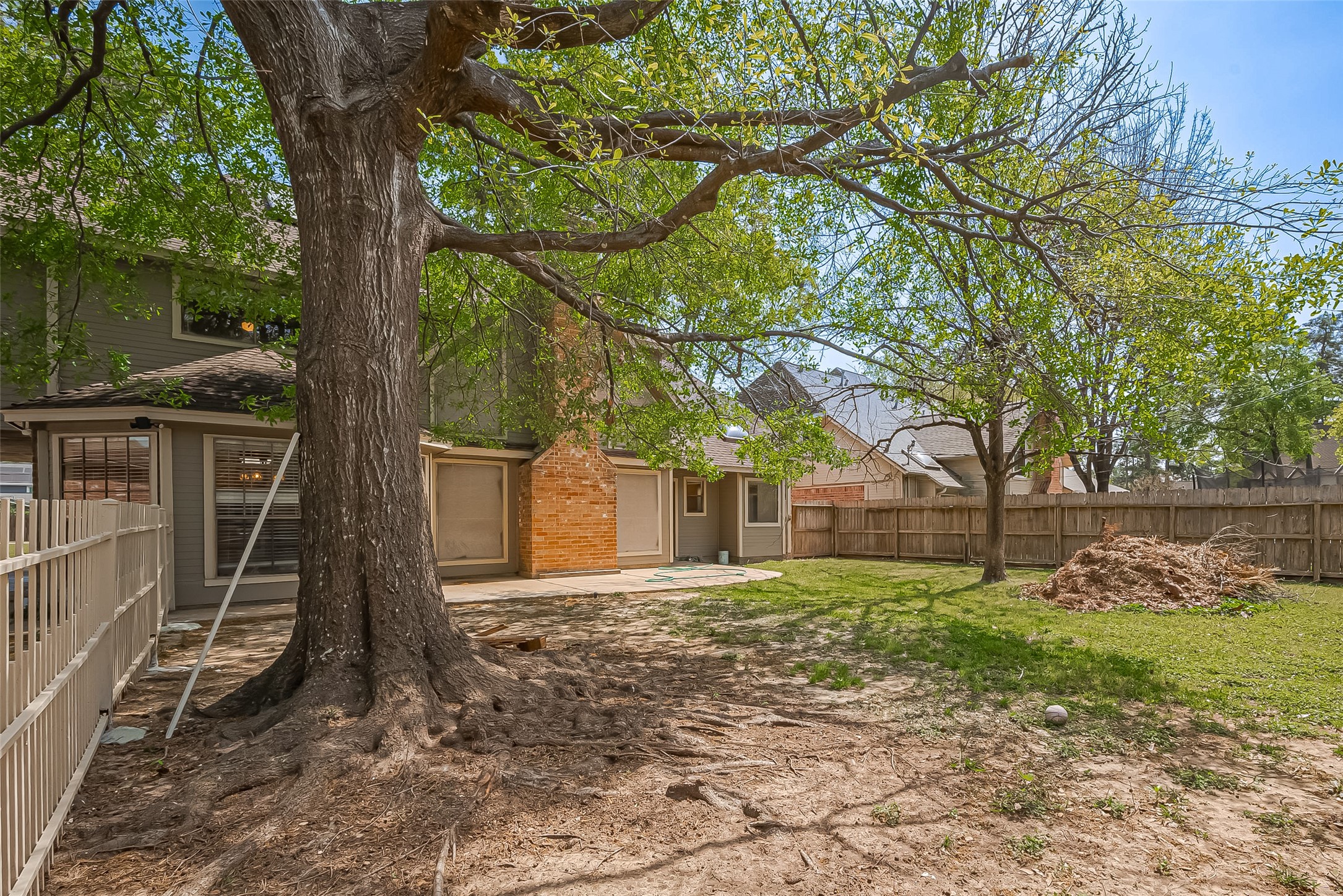 18307 Champion Forest Drive Spring, TX 77379 - Photo 46 of 49 a backyard of a house with lots of green space