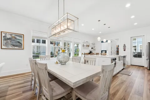 a bedroom with a bed and a lamp