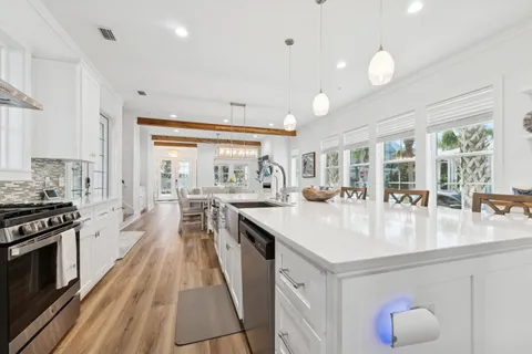 a bedroom with a bed and a ceiling fan