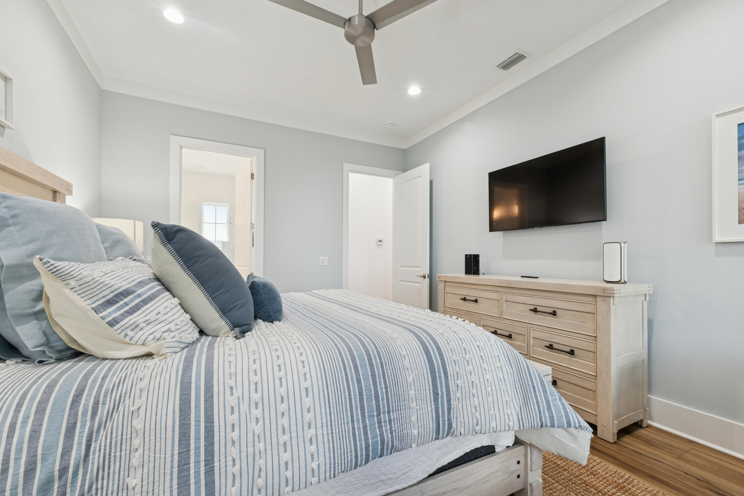 342 Beach Bike Way Inlet Beach Inlet Beach, FL 32461 - Photo 26 of 77 a bedroom with a bed and a flat screen tv