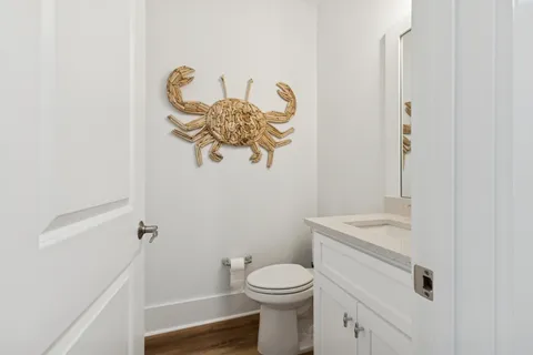 a balcony with furniture and a potted plant