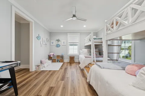 an aerial view of a residential houses with outdoor space and swimming pool