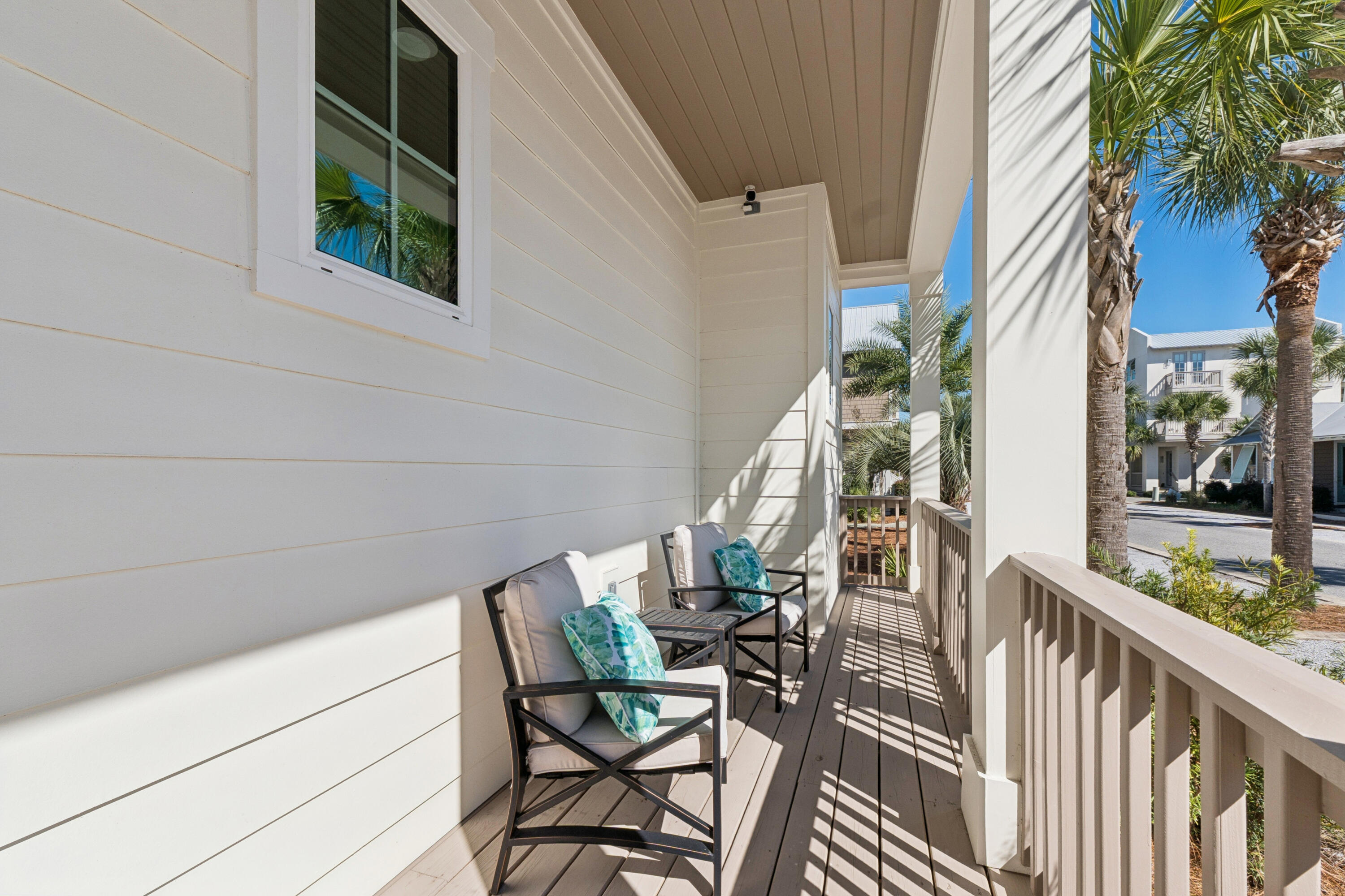 342 Beach Bike Way Inlet Beach Inlet Beach, FL 32461 - Photo 77 of 77 a view of balcony with wooden floor and outdoor seating