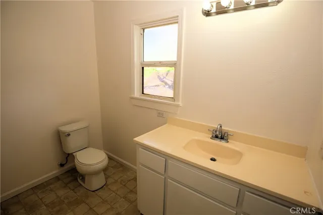 a bathroom with a sink and a toilet