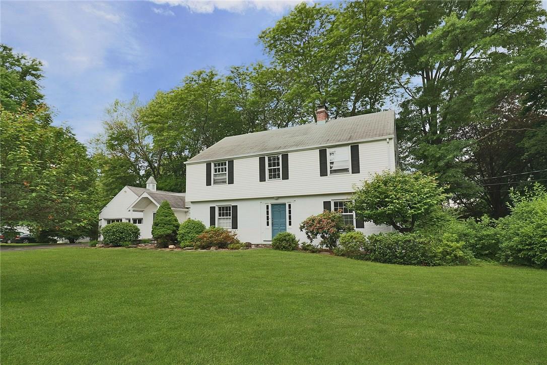 15 Flower Hill Road Poughkeepsie, NY 12603 - Photo 1 of 1 a front view of a house with a garden