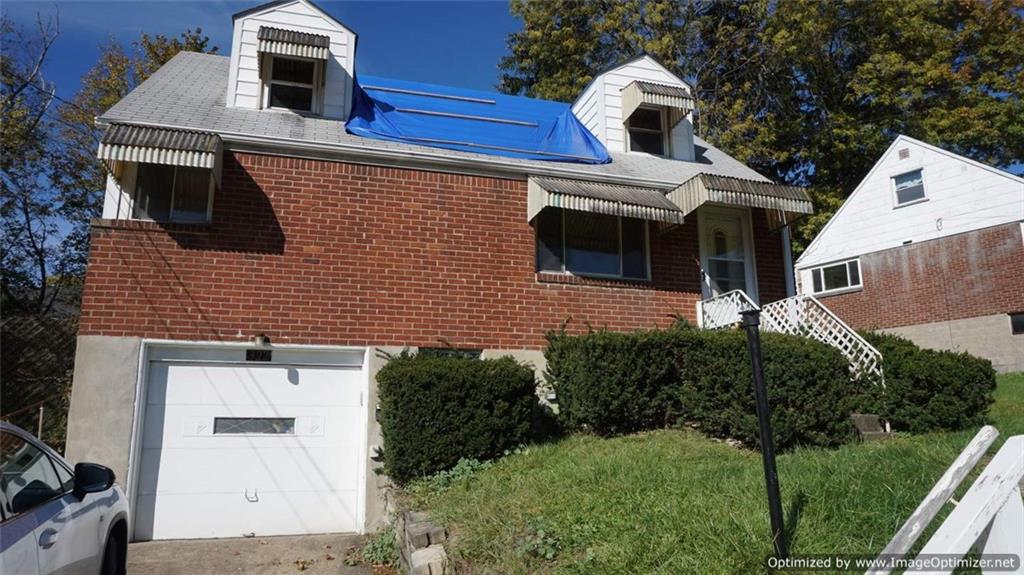 322 Beulah Road Pittsburgh, PA 15235 - Photo 1 of 22 a view of a house with a yard