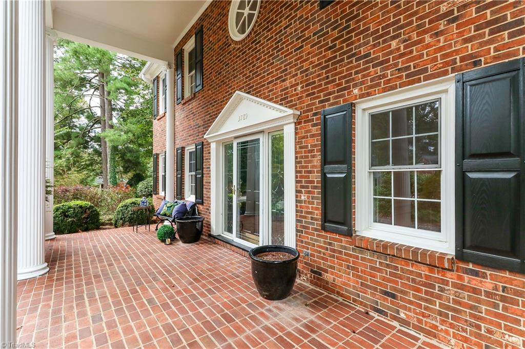 3789 Kirklees Road Winston-Salem, NC 27104 - Photo 3 of 25 Gracious front porch provides a comfortable place for people to sit and visit