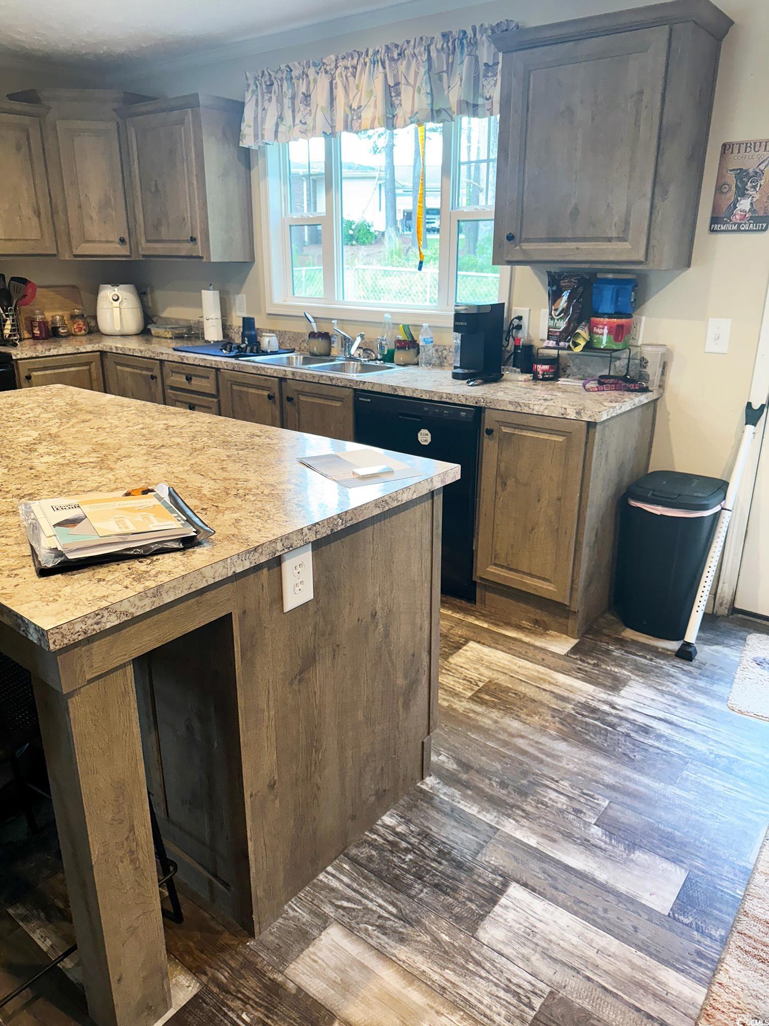 2620 Red Bluff Road Loris, SC 29569 - Photo 12 of 33 Kitchen with wood finished floors, light counterto