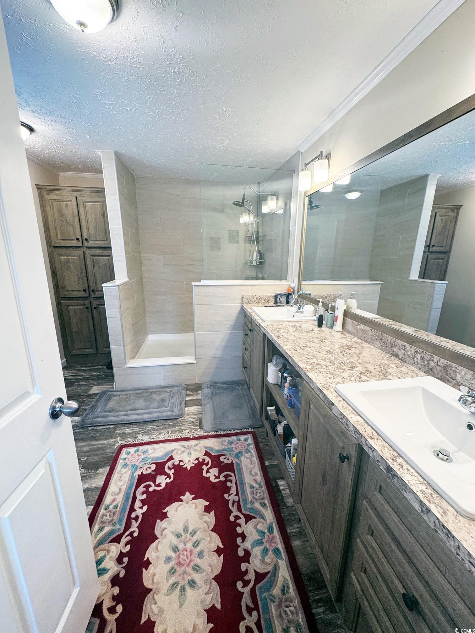 2620 Red Bluff Road Loris, SC 29569 - Photo 22 of 33 Full bathroom featuring a textured ceiling, double