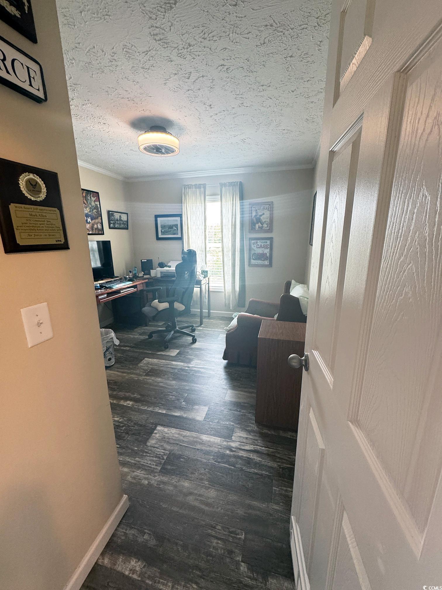 2620 Red Bluff Road Loris, SC 29569 - Photo 25 of 33 Home office with ornamental molding, wood finished