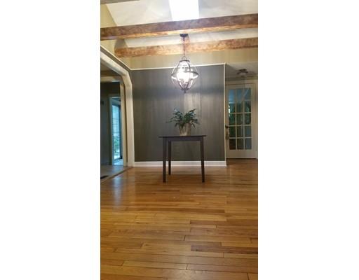 374 Grand Valley Road Springfield, MA 01128 - Photo 8 of 28 a view of a room with a table and a potted plant