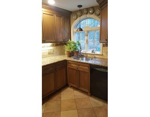 374 Grand Valley Road Springfield, MA 01128 - Photo 10 of 28 a kitchen with a sink cabinets and window