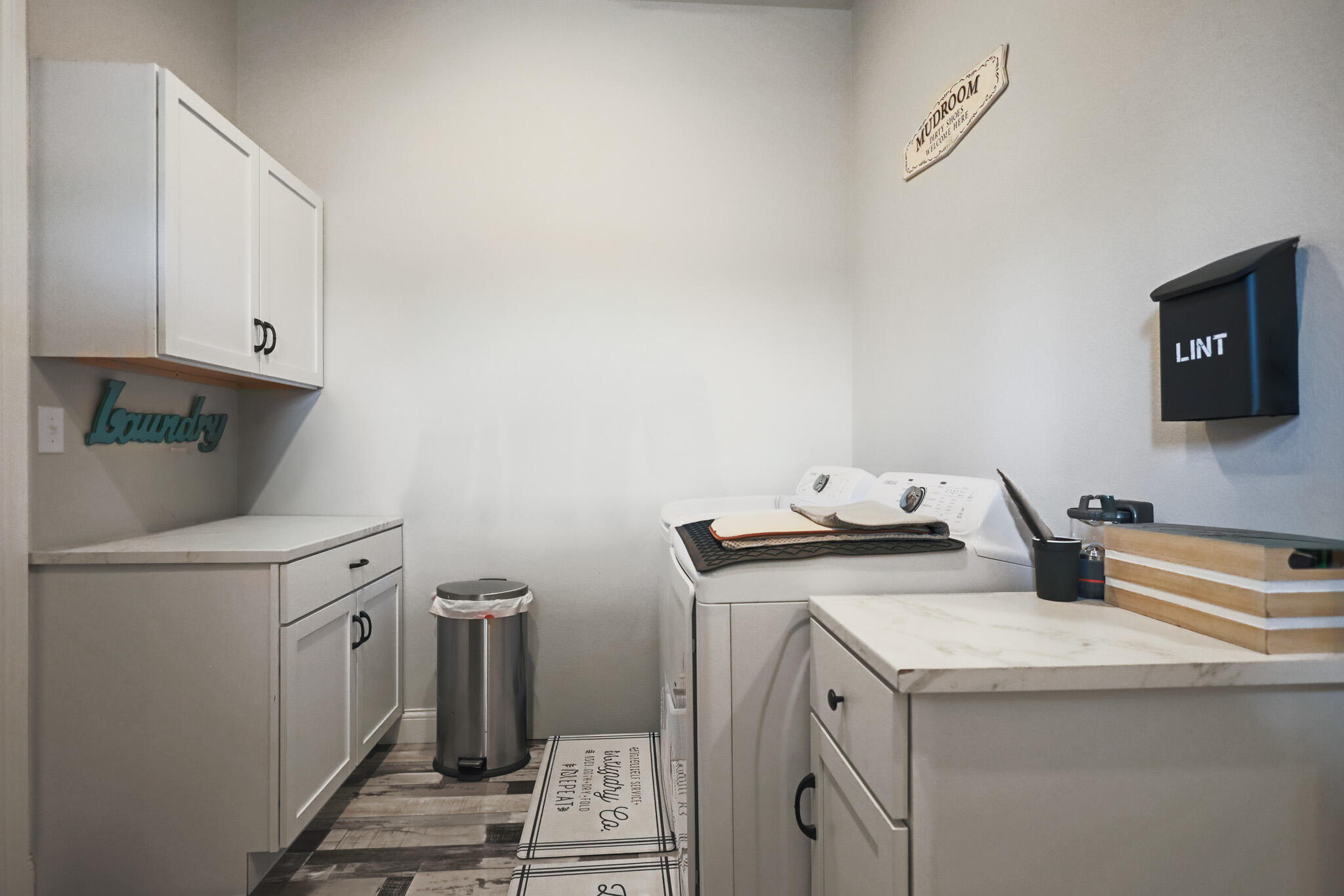 301 Fagan Road Snyder, TX 79549 - Photo 75 of 102 a view of storage and utility room with washer and dryer