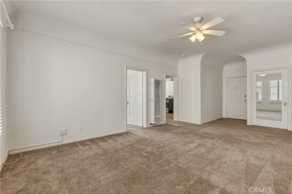 an empty room with a bathroom