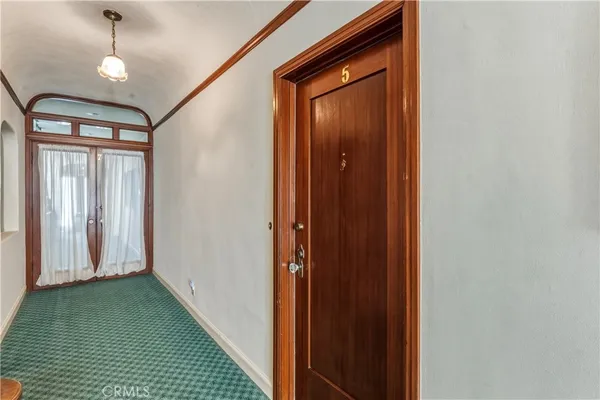 a view of entryway with a front door