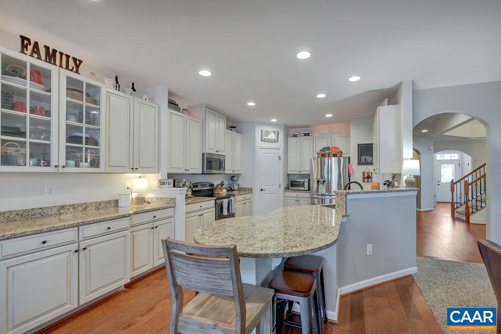 2346 Jersey Pine Ridge Charlottesville, VA 22911 - Photo 15 of 45 a kitchen with granite countertop kitchen island a center island a sink stainless steel appliances and cabinets
