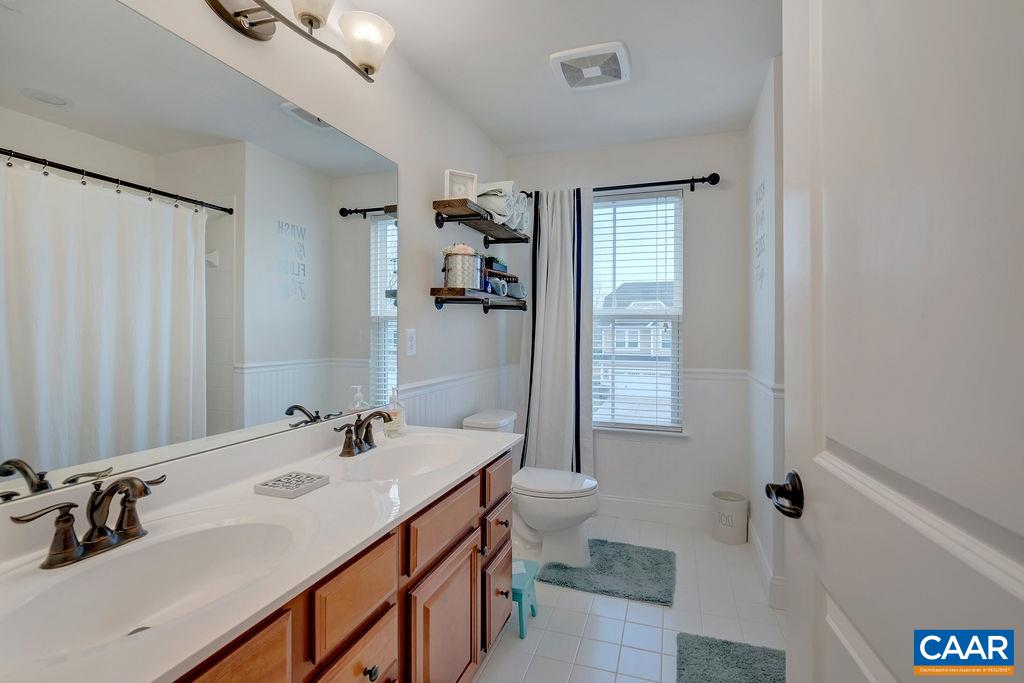 2346 Jersey Pine Ridge Charlottesville, VA 22911 - Photo 23 of 45 a bathroom with a sink and mirror with toilet