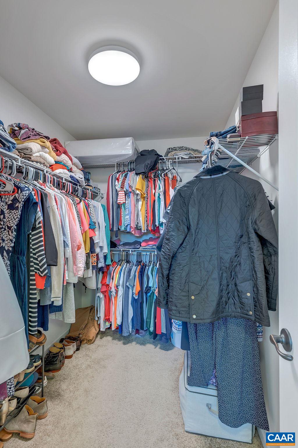 2346 Jersey Pine Ridge Charlottesville, VA 22911 - Photo 35 of 45 a view of walk in closet with clothes and shoes