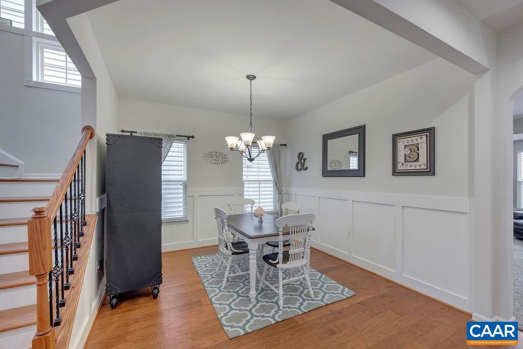 2346 Jersey Pine Ridge Charlottesville, VA 22911 - Photo 10 of 45 a dining room with chandelier and wooden floor