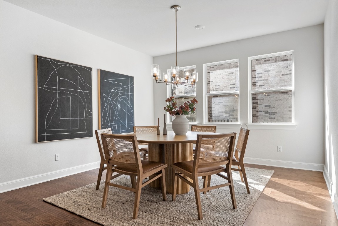177 Running Bird Road Austin, TX 78737 - Photo 15 of 40 a view of a dining room with furniture window and outside view