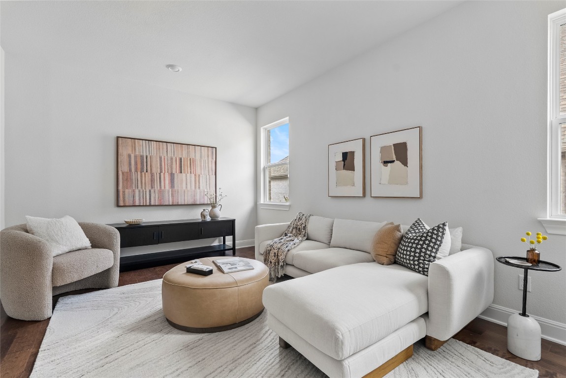 177 Running Bird Road Austin, TX 78737 - Photo 18 of 40 a living room with furniture and a couch