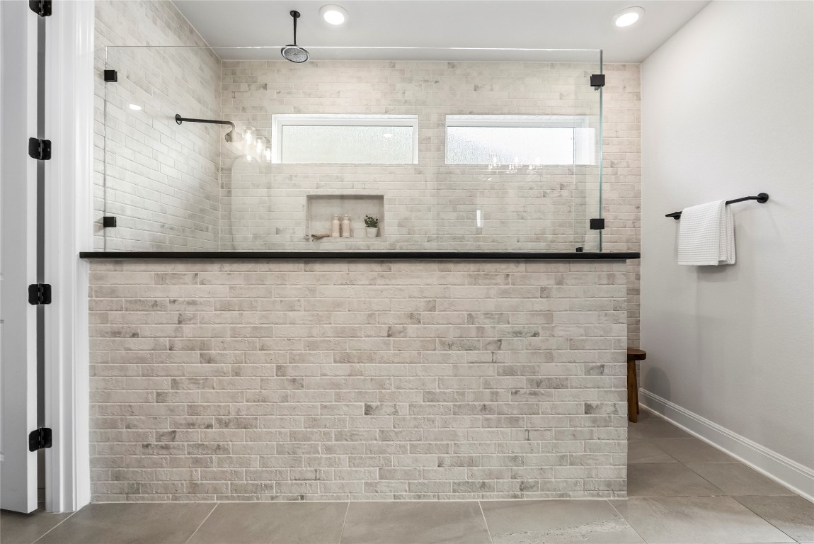 177 Running Bird Road Austin, TX 78737 - Photo 23 of 40 a view of a bathroom with a shower