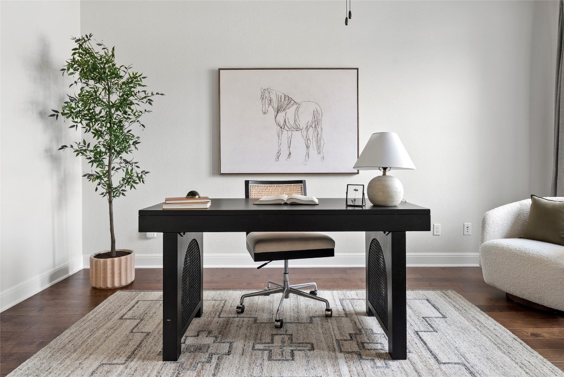 177 Running Bird Road Austin, TX 78737 - Photo 29 of 40 a living room with furniture and a potted plant