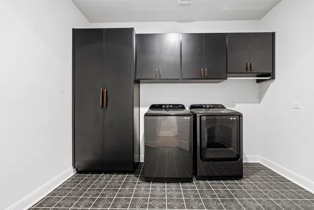a view of a refrigerator in kitchen