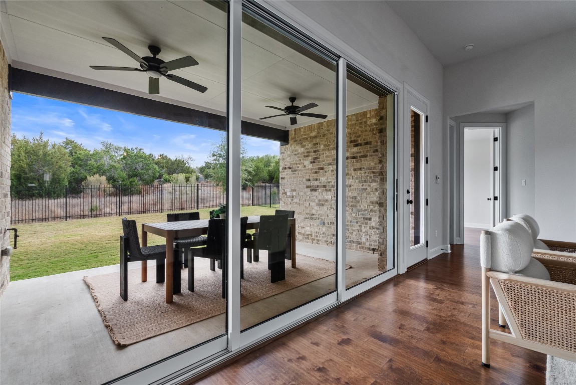 177 Running Bird Road Austin, TX 78737 - Photo 5 of 40 a view of a porch with furniture and yard