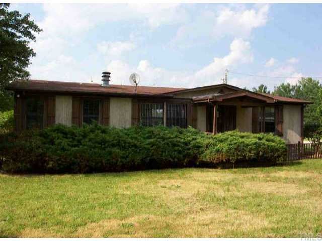 6409 Riley Hill Road Wendell, NC 27591 - Photo 1 of 1 a view of a house with garden