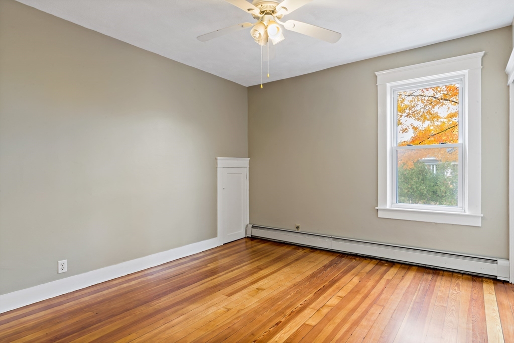 1000 Riverside Avenue Somerset, MA 02726 - Photo 11 of 26 wooden floor in an empty room with a window