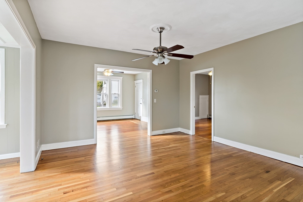 1000 Riverside Avenue Somerset, MA 02726 - Photo 6 of 26 a view of an empty room with window and wooden floor