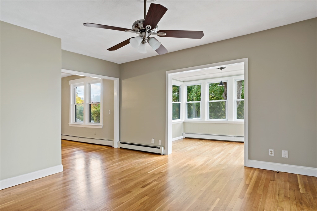 1000 Riverside Avenue Somerset, MA 02726 - Photo 7 of 26 a view of an empty room with a window and wooden floor
