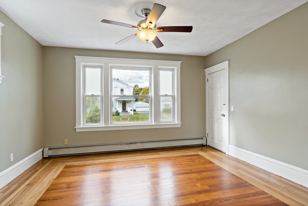 1000 Riverside Avenue Somerset, MA 02726 - Photo 9 of 26 a view of empty room with wooden floor and fan
