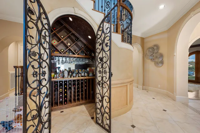 a view of a dining room with a table and chairs