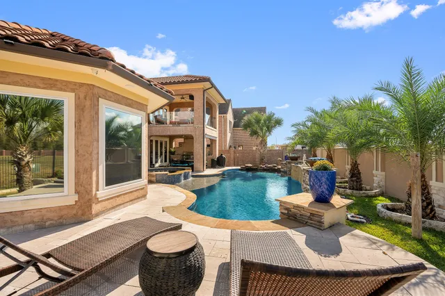 front view of a house with a patio