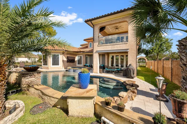 a view of entryway with wooden floor and door