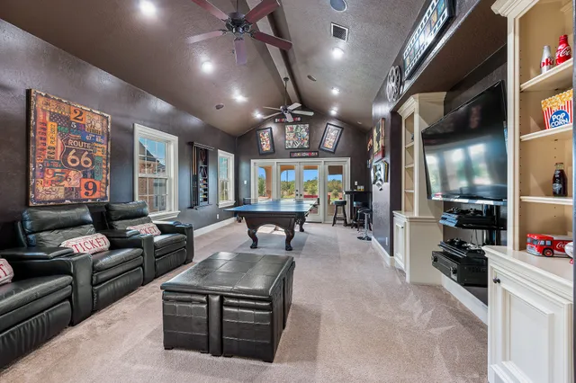a outdoor living space with furniture and a floor to ceiling window