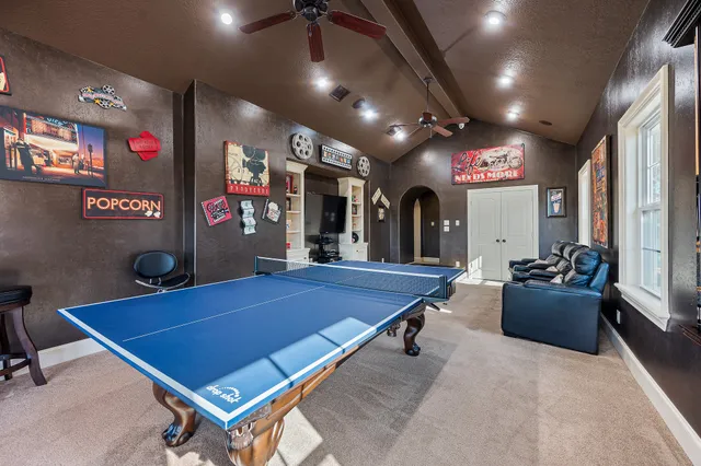 a outdoor living space with furniture and a potted plant