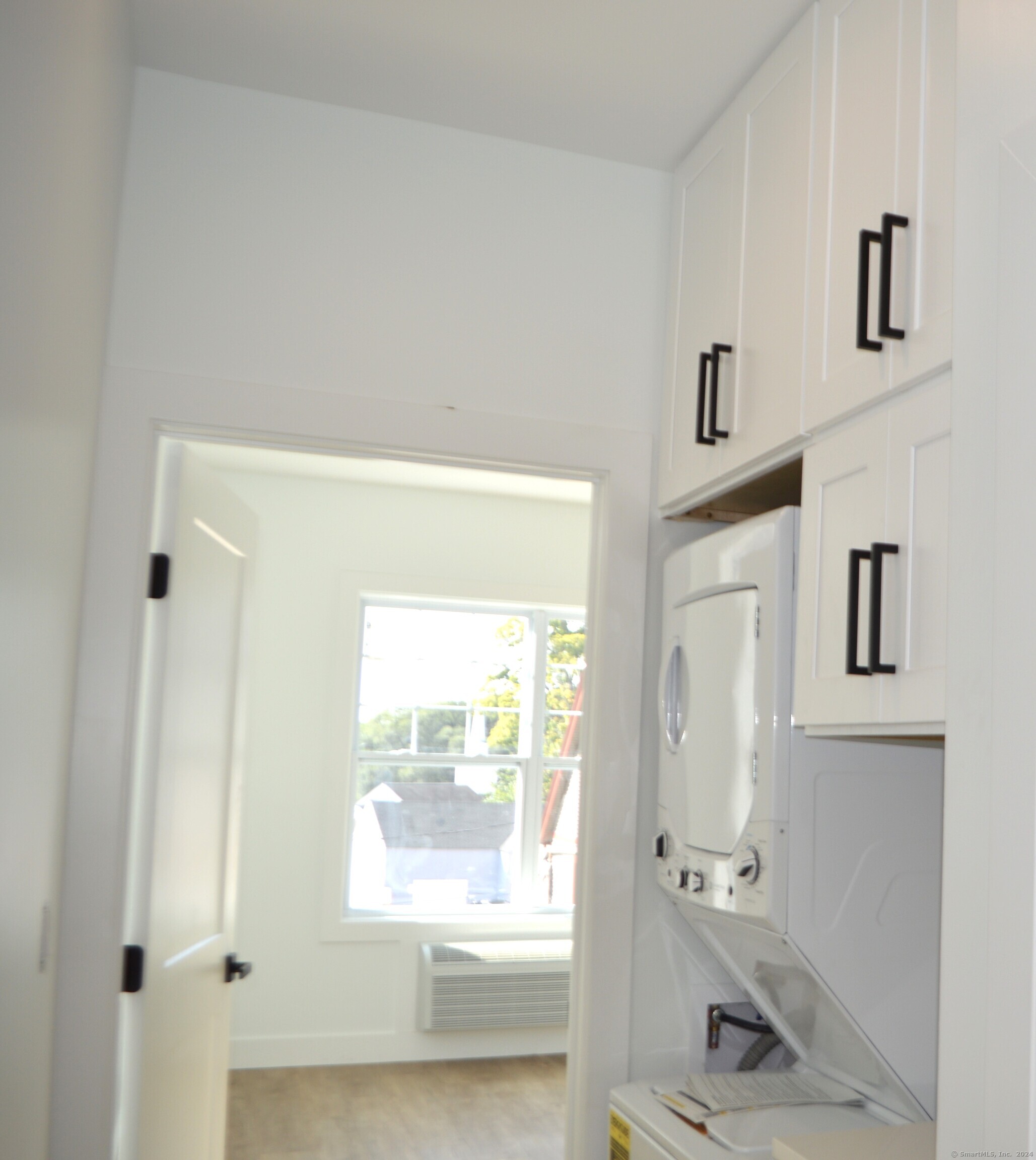 25 Church Street, Unit 106 New Milford, CT 06776 - Photo 10 of 11 a bathroom with a bathtub and a window